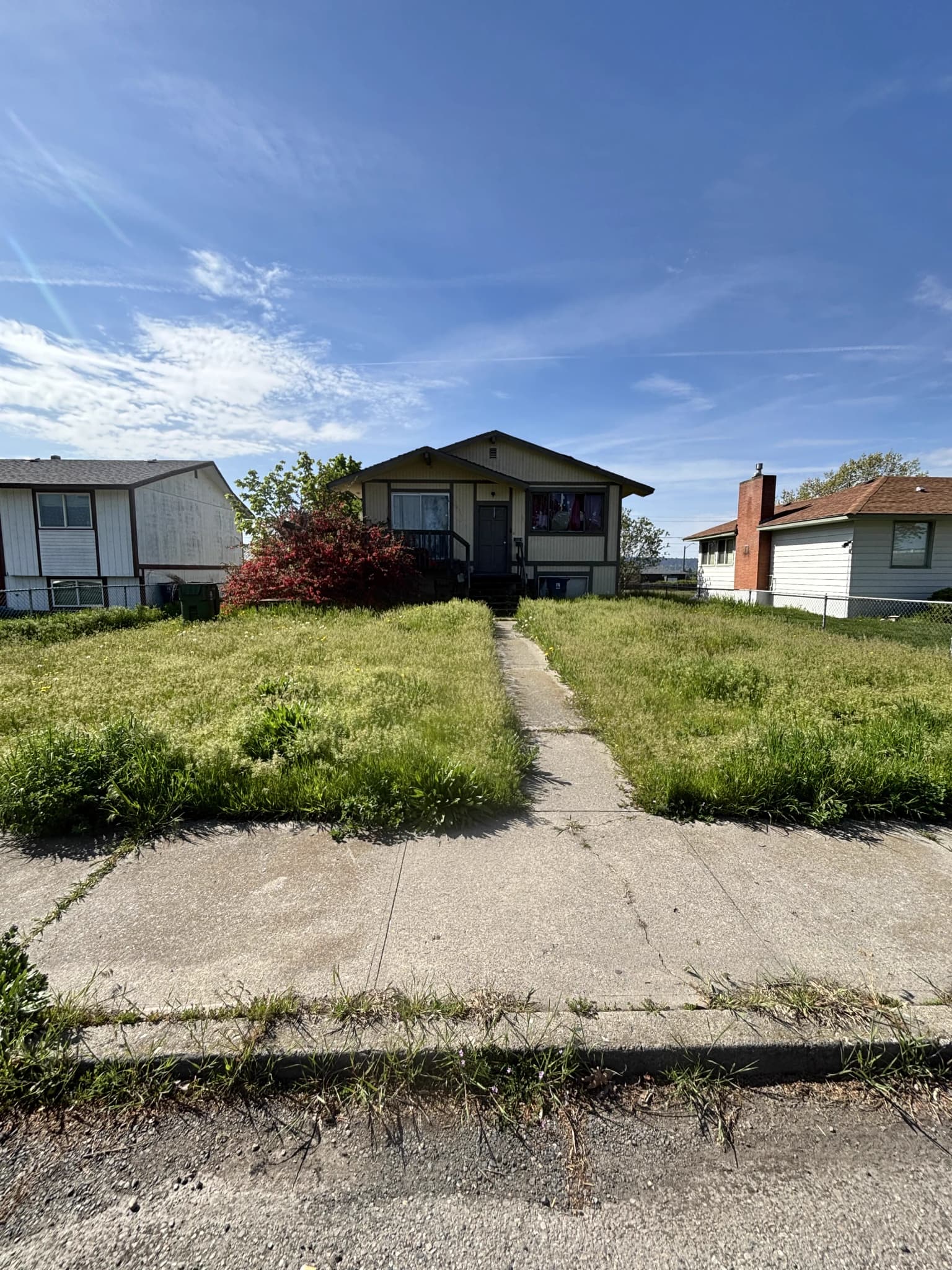 Spokane house exterior reviewed for an as-is cash offer